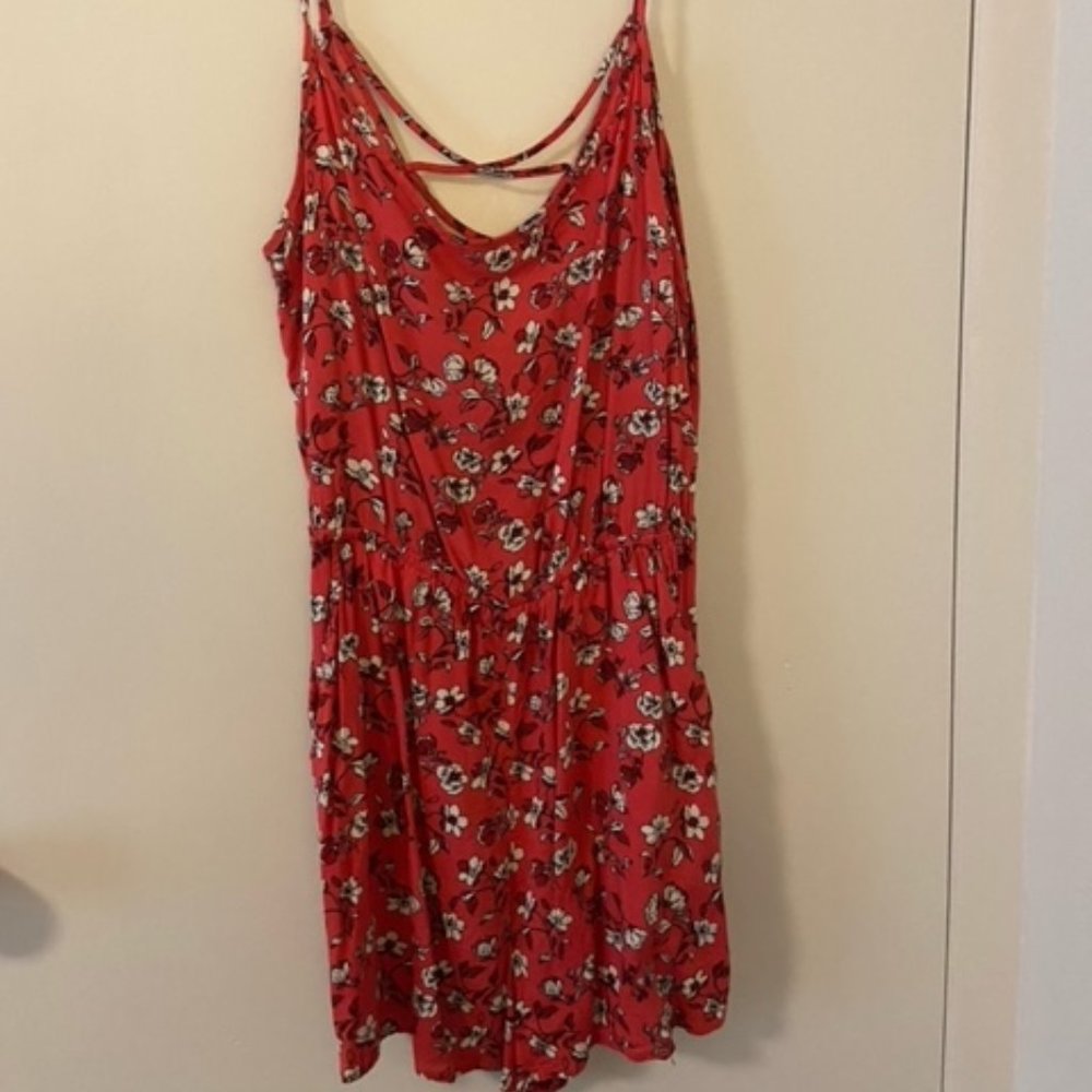 Woman's H&M red floral romper with cut out back, size 8